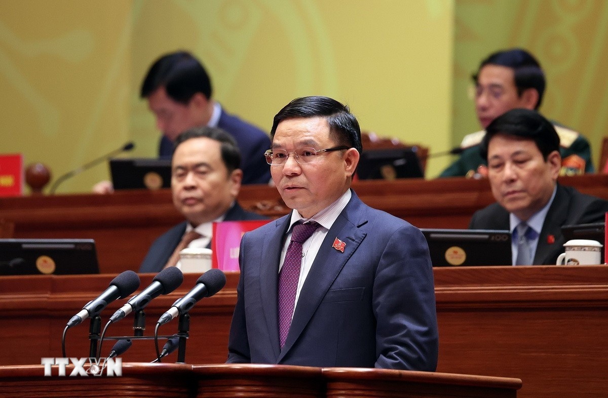 Đồng chí Lê Mạnh Hùng, Bí thư Đảng ủy, Quyền Bộ trưởng Bộ Công Thương, trình bày tham luận tại Đại hội XIV của Đảng (Ảnh: TTXVN)